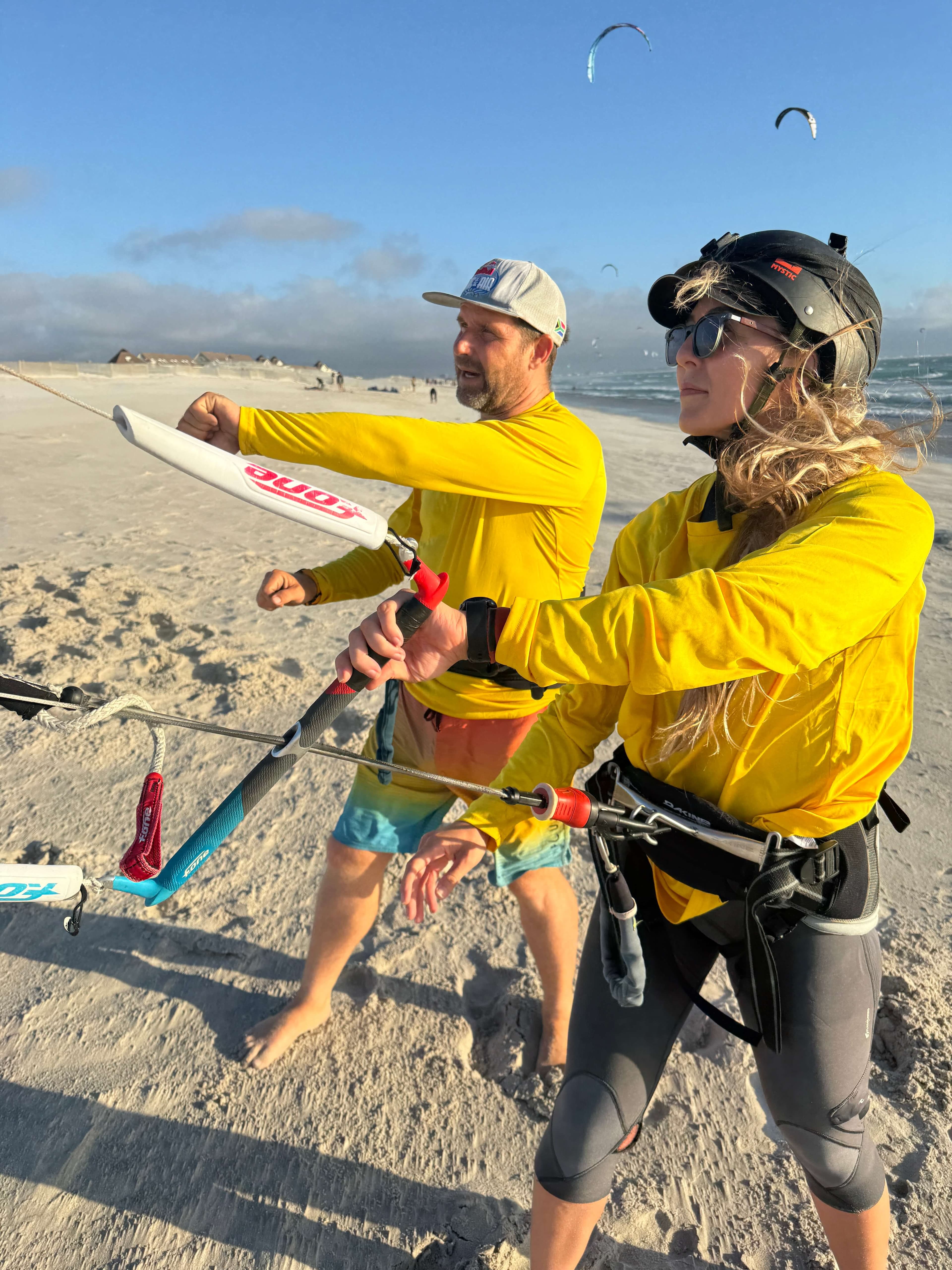 Instructor teaching bar control technique to student