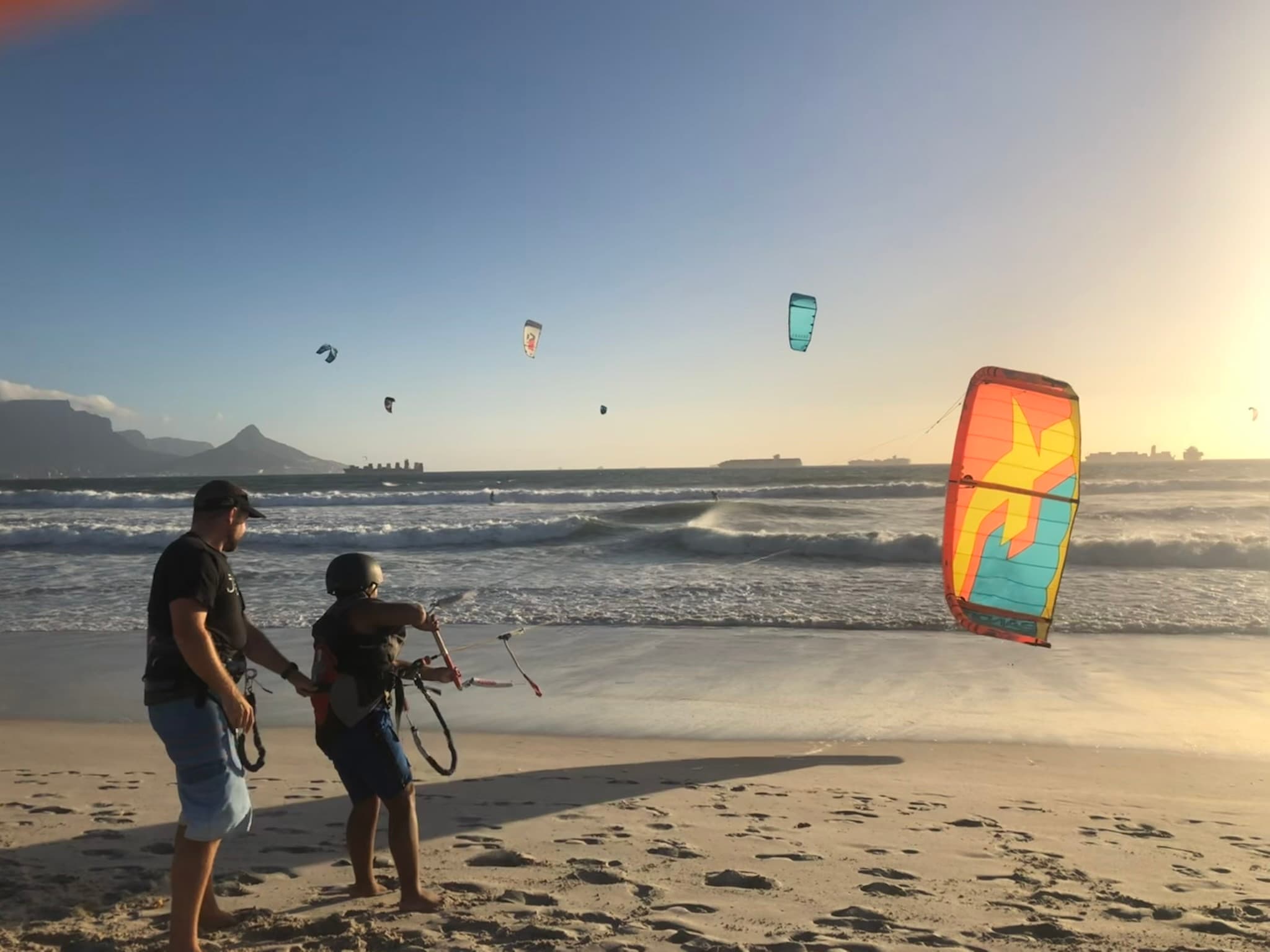 Kitesurfing lesson at sunset